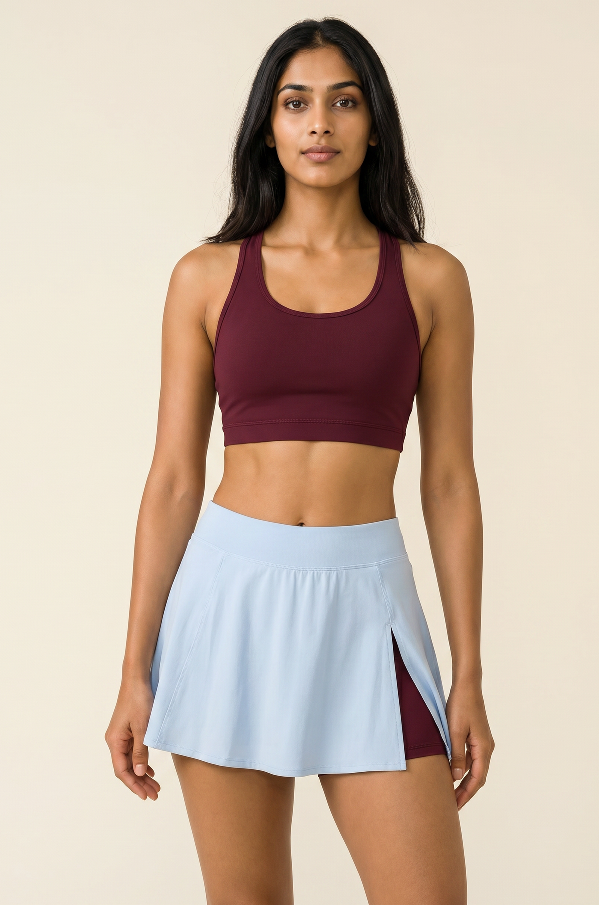 Aurora Ember Skort Set β Earth Red burgundy racerback bra with Horizon Blue side-slit skort on Indian model