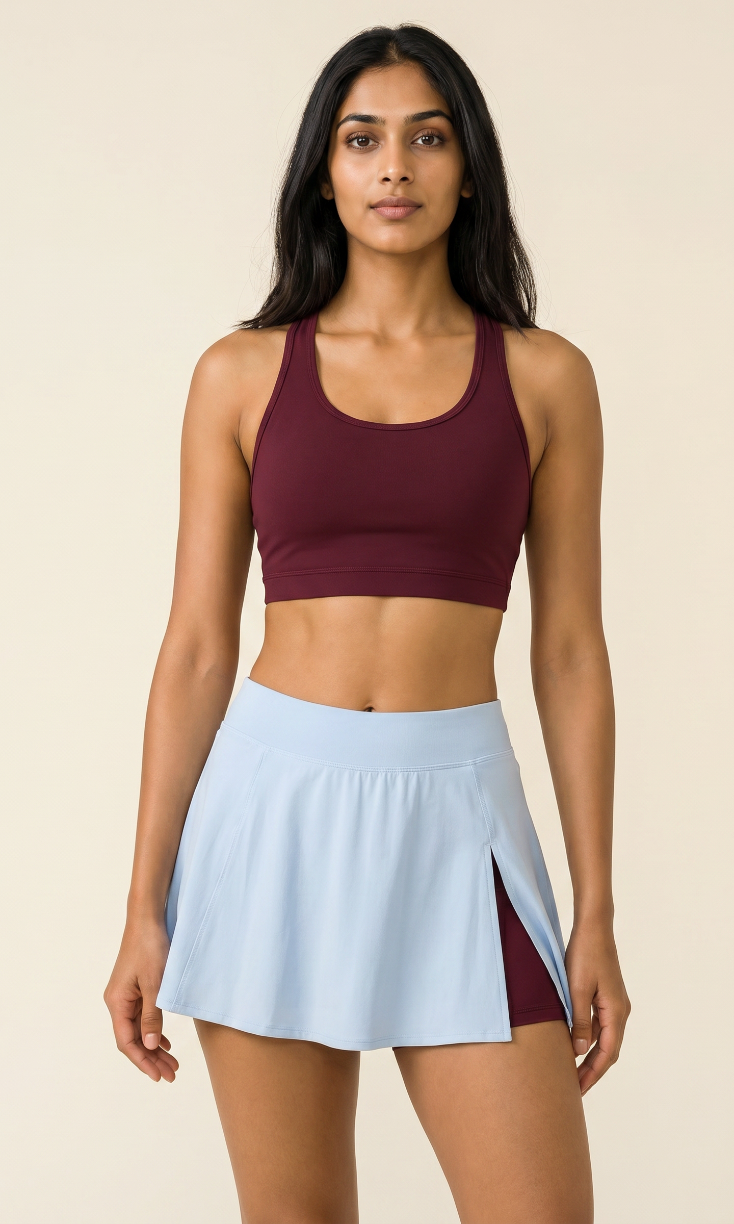 Aurora Ember Skort Set β Earth Red burgundy racerback bra with Horizon Blue side-slit skort on Indian model