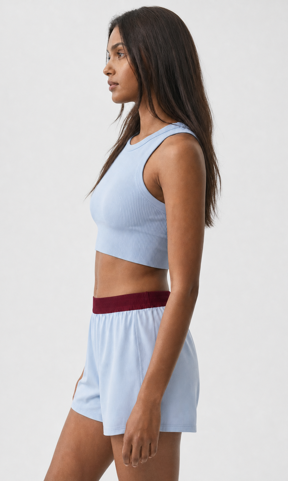 Ice Blue shorts with burgundy waistband - side view on model