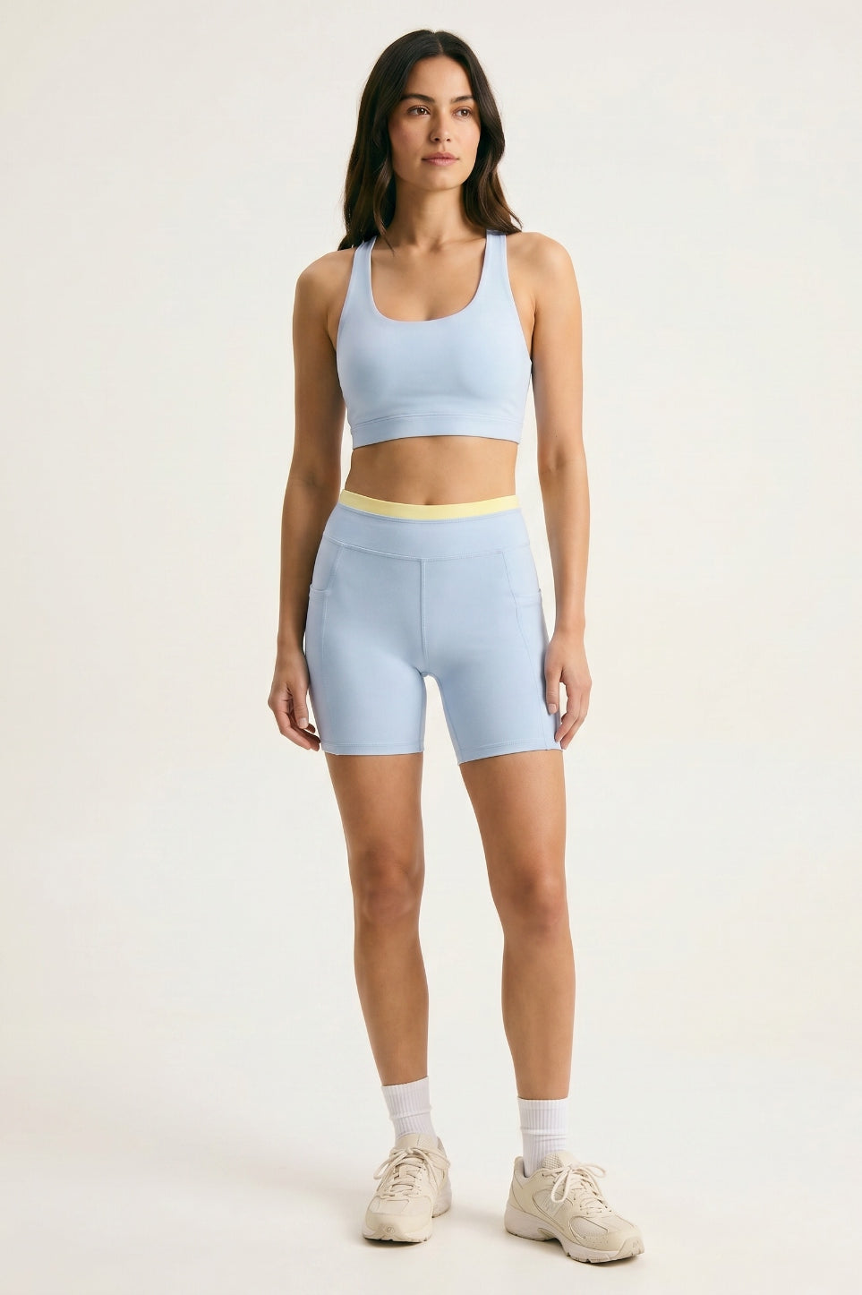 Skyline Reversible Set — Horizon Blue racerback bra and matching biker shorts with butter yellow waistband, front view