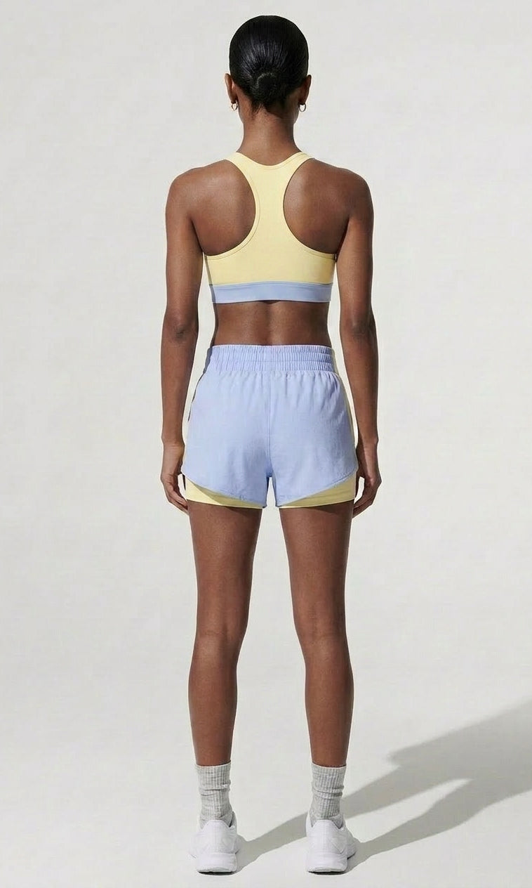 Terraloop DualWave Shorts - Back view showing yellow colorblock panels