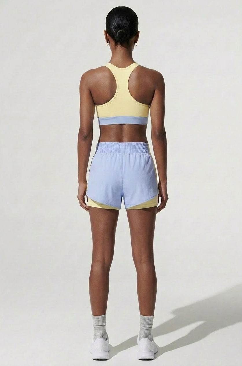 Terraloop DualWave Shorts - Back view showing yellow colorblock panels