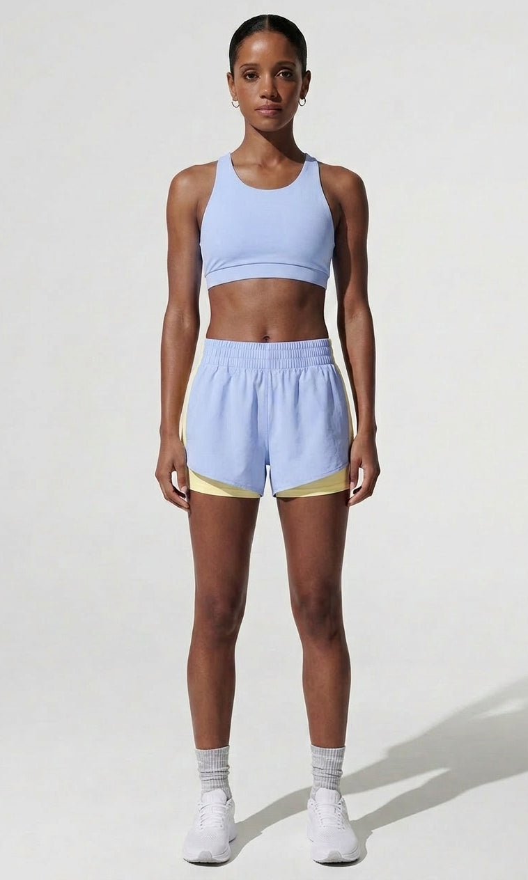 Terraloop DualWave Shorts - Front full-body view in Horizon Blue with yellow panels
