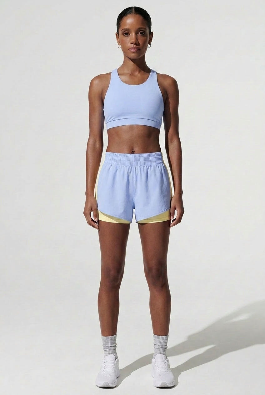 Terraloop DualWave Shorts - Front full-body view in Horizon Blue with yellow panels